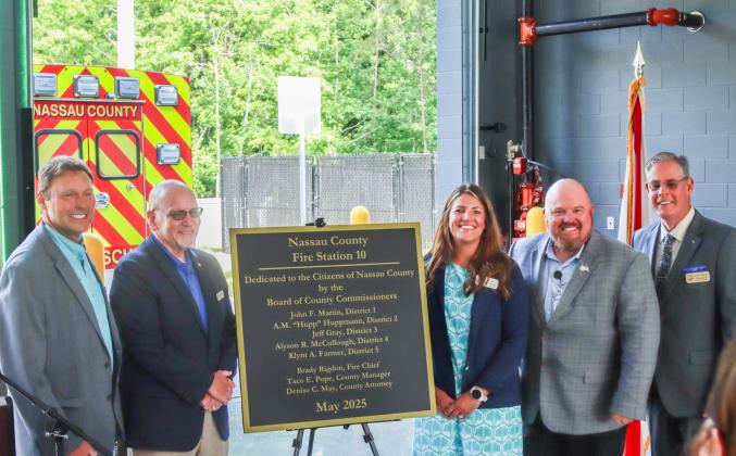 Nassau County held a ribbon-cutting ceremony Wednesday for Fire Rescue Station 10. From left, Fire Rescue Chief Brady Rigdon, commissioners Klynt Farmer, Jeff Gray and A.M. “Hupp” Huppmann, President of GreenPointe Holdings, LLC, Mike Taylor and commissioners Alyson McCullough and John Martin. From left, commissioners Jeff Gray, John Martin, Alyson McCullough, Klynt Farmer, A.M. "Hupp" Huppmann. Photo by Ashley Chandler/News-Leader