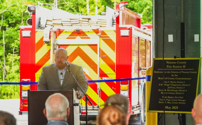 Commissioner Klynt Farmer speaks at the ribbon-cutting ceremony for Fire Station 10 held in at the station in Yulee on Wednesday. Photo by Ashley Chandler/News-Leader