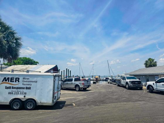 Moran Environmental Recovery was down at the Fernandina Harbor Marina on Monday to clean up a gasoline spill in the water. Photo by Ashley Chandler/News-Leader