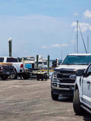 Moran Environmental Recovery was down at the Fernandina Harbor Marina on Monday to clean up a gasoline spill in the water. Photo by Ashley Chandler/News-Leader
