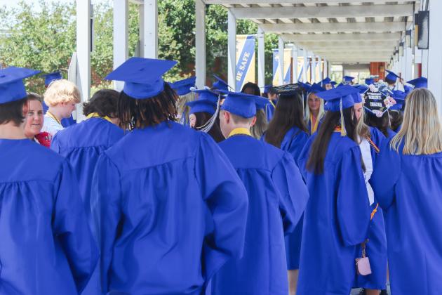 Fernandina Beach High School graduates Thursday outside Southside Elementary. FBHS graduation will be held tomorrow 11 a.m. tomorrow at the University of North Florida Arena. Photo by Ashley Chandler/News-Leader