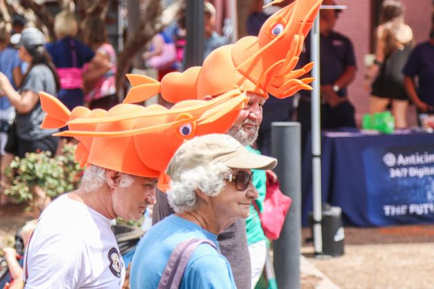Several attendees of the 60th anniversary Isle of Eight Flags Shrimp Festival donned shrimp hats over the weekend. Photo by Ashley Chandler/News-Leader
