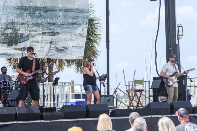 Andria Shinn and The Loyal Souls perform on Saturday at the 60th Isle of Eight Flags Shrimp Festival. The Riverfront Stage at the marina in Downtown was host to entertainment of many kinds such as the Miss Shrimp Festival 2025 Scholarship Pageant; shrimp and ice-cream eating contests and other contests; Invasion of the Pirates! and various musical performances.