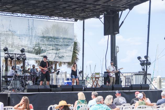 Andria Shinn and The Loyal Souls perform on Saturday at the 60th Isle of Eight Flags Shrimp Festival. The Riverfront Stage at the marina in Downtown was host to entertainment of many kinds such as the Miss Shrimp Festival 2025 Scholarship Pageant; shrimp and ice-cream eating contests and other contests; Invasion of the Pirates! and various musical performances.