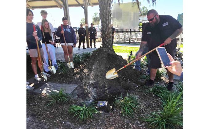 Fernandina Beach employee Chad Manning hand crafted and sealed the time capsule that was buried at the visitor’s center on Centre Street, and helped bury it Wednesday. Photo by Julia Roberts/News-Leader
