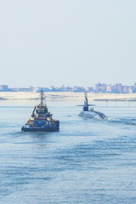 Mass Communications Specialist Seaman Christian Kibler | U.S. Navy The Ohio-class cruise missile submarine USS Georgia (SSGN 729) transits the Suez Canal on Sept. 9, 2024, while being escorted by the Arleigh Burke-class guided missile destroyer USS Michael Murphy (DDG 112). 