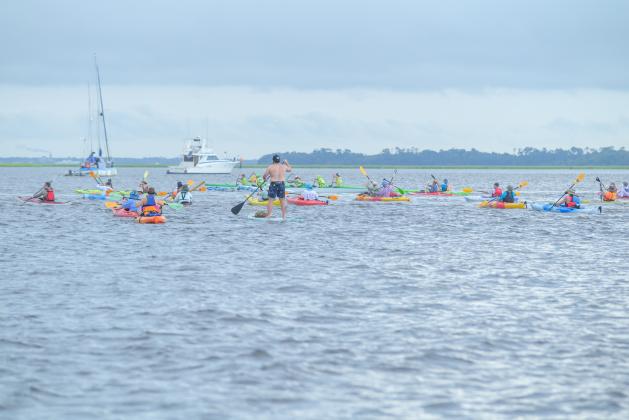 Paddlers take part in the 2024 Cross the Line Paddle for Veterans event. The annual event is set for June 21. File photo