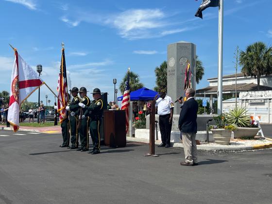From left, Color Guard, Rear Admiral Gene Kendall and Ed Cook at the Memorial Day ceremony the Fernandina Beach Veterans of Foreign Wars Post 4351 hosted on Front and Center on May 26. Photos courtesy of VFW 4351