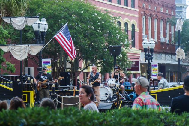 On Friday, the Sounds on Centre music series began as usual, but only three songs into Tommy Peacock’s set, the rain came crashing down on Centre Street. The concert did not resume. Photos by Ashley Chandler/News-Leader