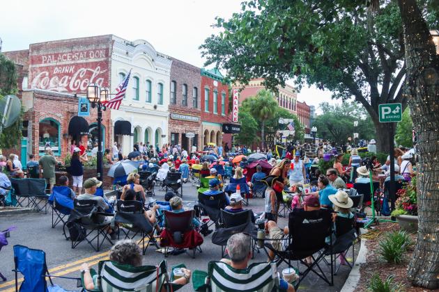 On Friday, the Sounds on Centre music series began as usual, but only three songs into Tommy Peacock’s set, the rain came crashing down on Centre Street. The concert did not resume. Photos by Ashley Chandler/News-Leader
