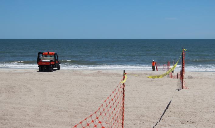Beach renourishment at Main Beach on May 22. Photo by Ashley Chandler/News-Leader