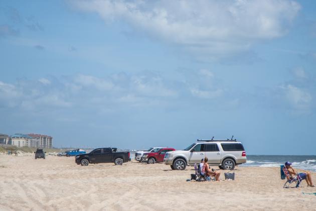 Automobiles are shown at American Beach on May 1. Ashley Chandler/News-Leader