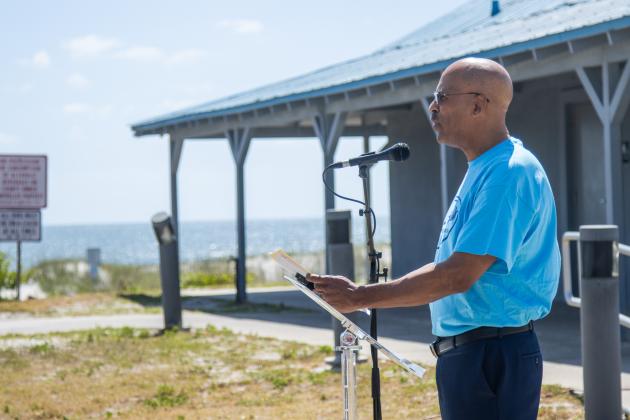 Mark Dawkins, president of Save Historic American Beach, speaks at a press conference hosted by the nonprofit on May 1, following a lawsuit the group filed against Nassau County on April 30 in an effort to put a stop to beach driving on the historic district’s beaches. Ashley Chandler/News-Leader