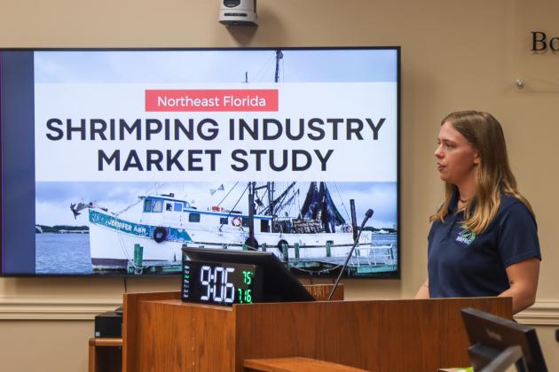 Cassidy Taylor, economic recovery coordinator for Northeast Florida Regional Council, presented the council’s shrimping industry recommendations Monday to the Nassau County Board of County Commissioners. Photo by Ashley Chandler/News-Leader