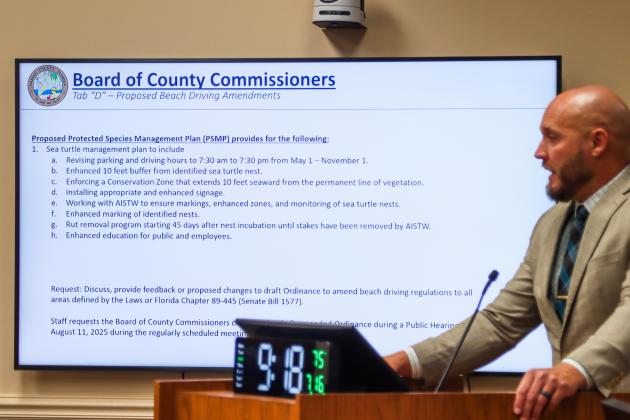 County Manager Taco Pope speaks on proposed changes to the beach activities in unincorporated areas of Nassau County on Wednesday at the Board of County Commissioners meeting. Photo by Ashley Chandler/News-Leader