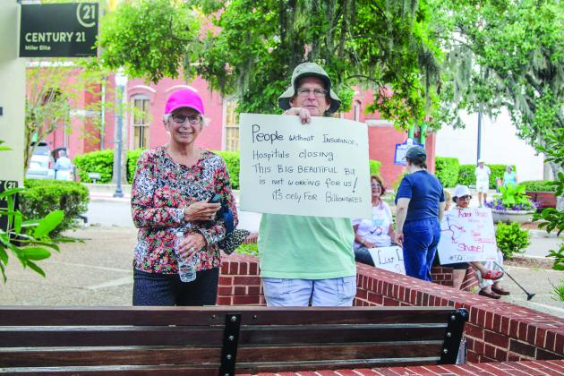 Unified Nassau Florida, a nonpartisan political group in its infancy rooted in progressive values held a protest July 7 outside Congressman Aaron Bean’s local office. Photo by Ashley Chandler/News-Leader