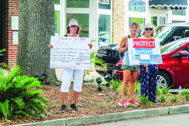 Unified Nassau Florida, a nonpartisan political group in its infancy rooted in progressive values held a protest July 7 outside Congressman Aaron Bean’s local office. Photo by Ashley Chandler/News-Leader