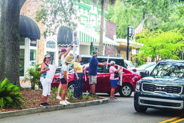 Unified Nassau Florida, a nonpartisan political group in its infancy rooted in progressive values held a protest July 7 outside Congressman Aaron Bean’s local office. Photo by Ashley Chandler/News-Leader