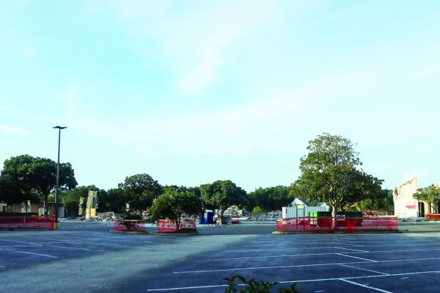 The majority of Publix had been leveled by July 4. Only rubble and a few standing structures remained Friday evening at the Island Walk Shopping Center. Photo by Ashley Chandler/News-Leader