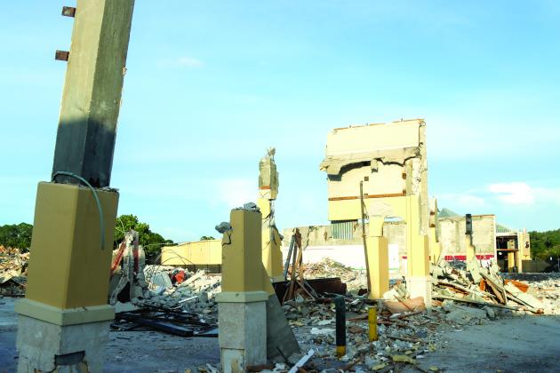 The majority of Publix had been leveled by July 4. Only rubble and a few standing structures remained Friday evening at the Island Walk Shopping Center. Photo by Ashley Chandler/News-Leader