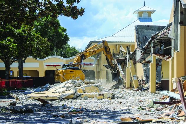 Workers demolish the Island Walk Publix on July 2. Photo by Ashley Chandler/News-Leader