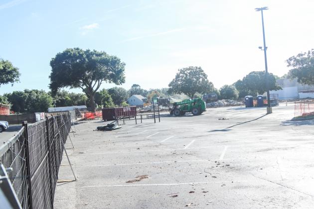Crews work to clear debris from the demolition of The Island Walk Publix on July 8. Photo by Ashley Chandler/News-Leader