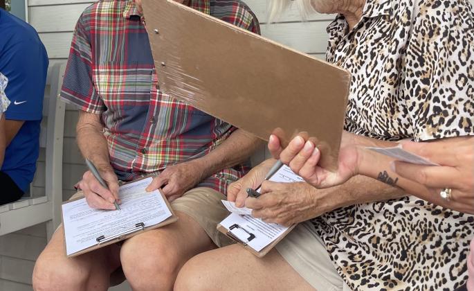 Residents sign petitions on Aug 17.  