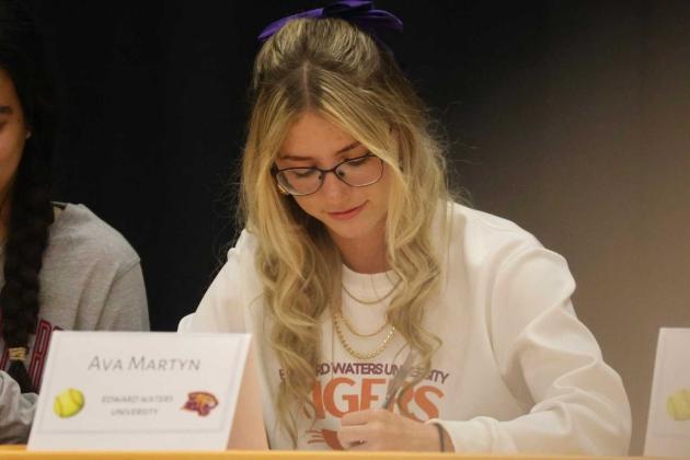 Ava Martyn celebrates her signing to Edward Waters University. Both were standout softball players at Yulee High School. Submitted photo