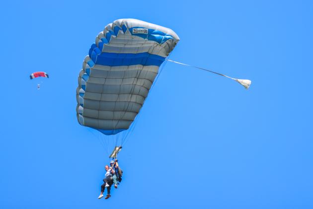 Marisa DeMar and Gregory Meyer mid-air after the jump on Aug. 15.  Photo by Ashley Chandler