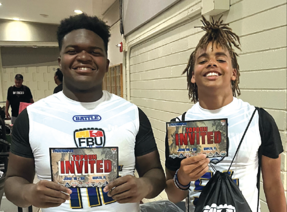 Fred Jones and Drayson Ricks with their invites to camp. Submitted photo