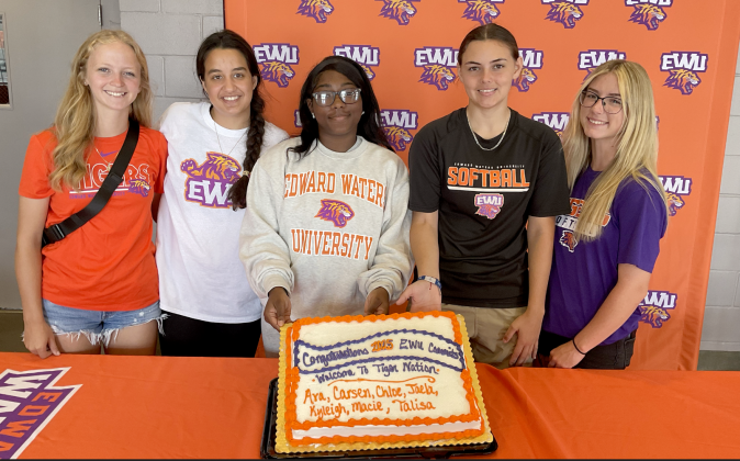 Edward Waters freshman pose with a cake made to celebrate them joining the team for the 2025 season. From left, Macie Bourgholtzer, Jacksonville; Kyleigh Golden, Yulee; Jaela Palmer, Jaksonville; Carsen Chmiel, Fernandina Beach; and Ava Martyn, Yulee. Submitted photo