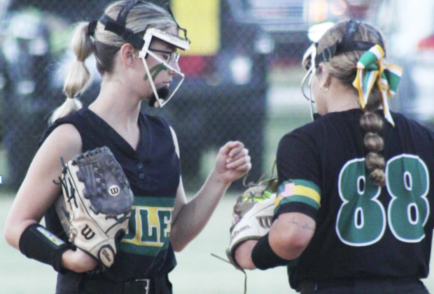Ava Martyn fist bumps a Yulee High School teammate in a former season. Submitted photo