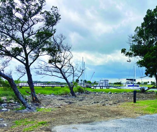 In this submitted photo of Tiger Point Marina, construction debris is among other material that make up the rip rap along the waters edge.