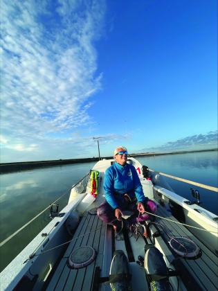 Smith on the row boat during their training for the Hometown Row. Submitted by Paul Lore 