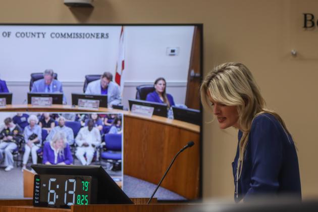 Lexus Harrison speaks at the Monday Aug. 25 Board of County Commissioners meeting. Harrison, who worked with the cats at the shelter, was primarily concerned about the lack of communication and overwork of the staff. Photo by Ashley Chandler/News-Leader