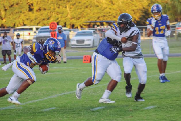 Traivon Martin broke a few tackles on a 14-yard run to score in the first quarter, putting the Pirates up 14-6.