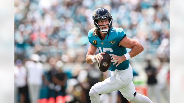  Quarterback Trevor Lawrence looks downfield during Jacksonville’s win Sunday. Photo courtesy of Jacksonville Jaguars