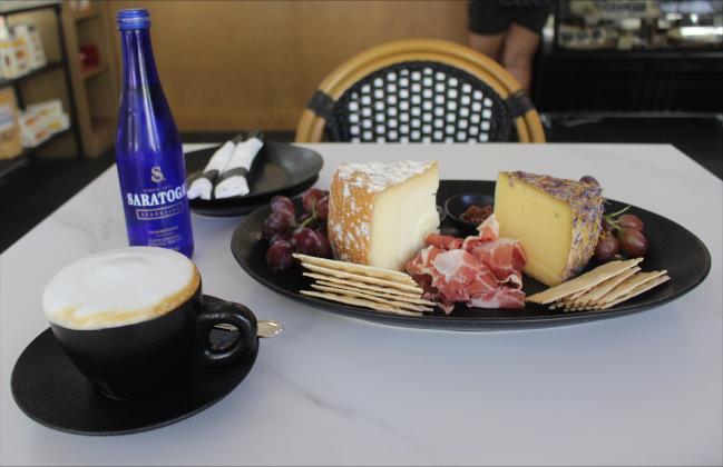 Cappuccino and charcuterie board at Marché Côtier By Marisa DeMar/News-Leader