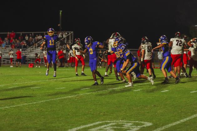 Fernandina Beach special teams unit players celebrate after the Indians’ missed PAT in the fourth quarter. The Pirates ran out the clock to win 28-27. Photo by Ashley Chandler/News-Leader