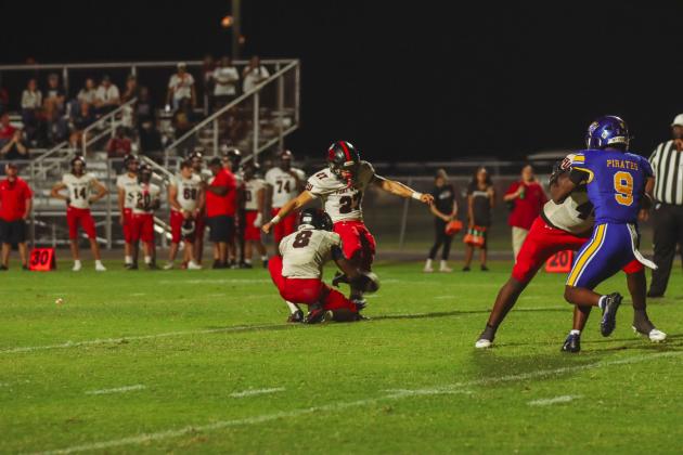 Indians attempt an extra point following their final touchdown in Week Four against the Pirates. The PAT was no-good and ended up being the game-deciding moment. The Pirates defeated the Indians 28-27. Photo by Ashley Chandler/News-Leader