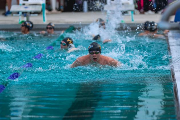 Yulee swimmers warm up for a meet at the Atlantic Recreation Center in August.  Photo by Ashley Chandler/News-Leader