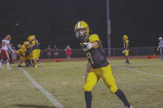 Hornets Wide Receiver Gunnar Gibson prepares for the play.  By Marisa DeMar/News-Leader