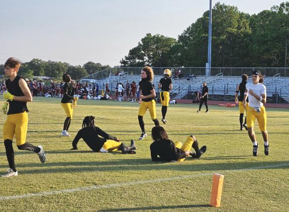 Hornets warm up ahead of their home game in Week. Photo by Jim Luksic/News-Leader