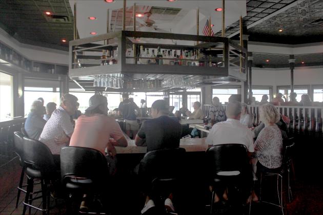 The completely full bar seating at Brett’s on Friday. 