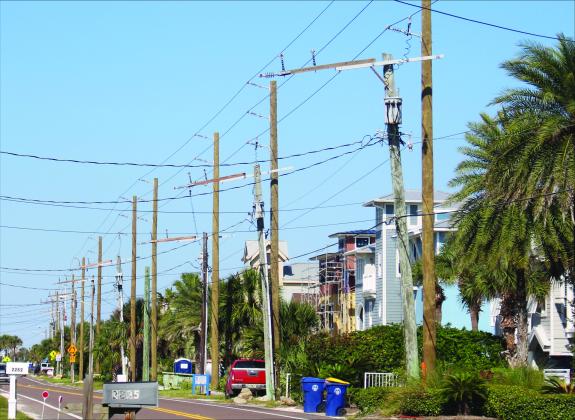 Marisa DeMar/News-Leader Abandoned electrical poles on Fletcher Avenue in Fernandina Beach.