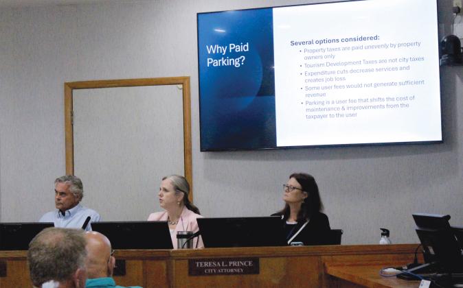 Marisa DeMar/News-Leader Sarah Campbell reiterates the reasoning for paid parking at the workshop on Tuesday.  