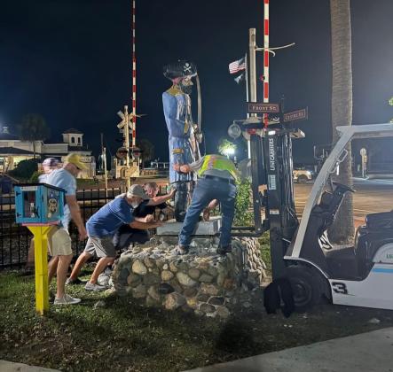 Photo courtesy of City of FB Facebook page Members of the Fernandina Pirates Club and the city move Peg Leg Pete at the crack of dawn Thursday.