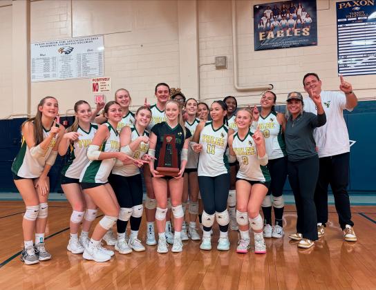 The Hornets varsity volleyball team holds their trophy after beating Paxon and earning the district champion title on Oct. 16. Submitted by Dorri Chin 