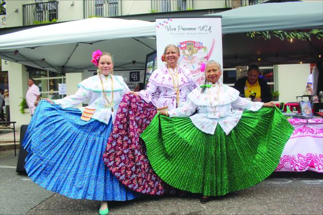 Members of the dance group, Viva Panama USA, showcase traditional Hispanic clothing at the Hispanic Heritage Festival in Fernandina Beach on Saturday.  