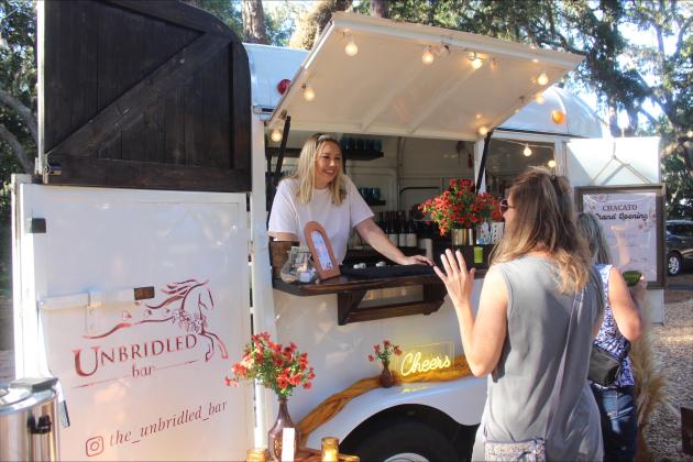 The Unbridled Bar serves drinks to guests at the Chacato grand opening. 